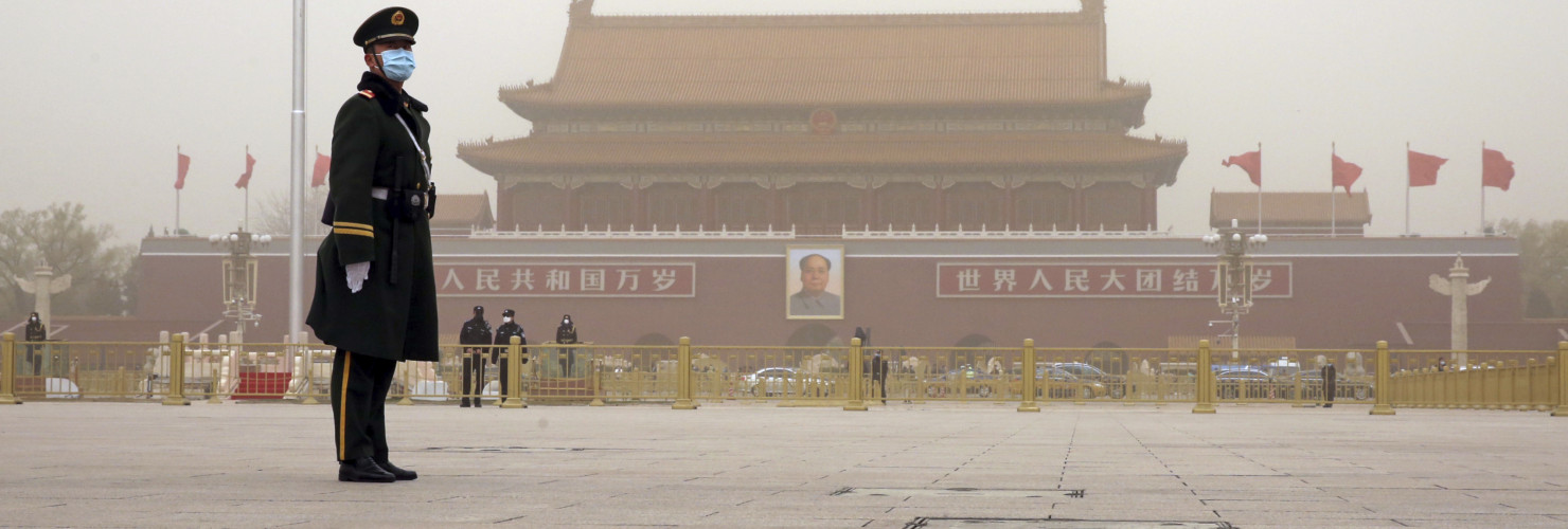 Police officers are seen at Tiananmen Square in Beijing, China