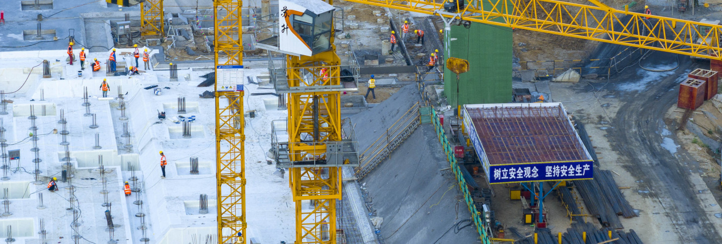 Aerial photo shows the working scene of a real estate construction site in Huai 'an City, Jiangsu Province, China, Aug. 1, 2023.