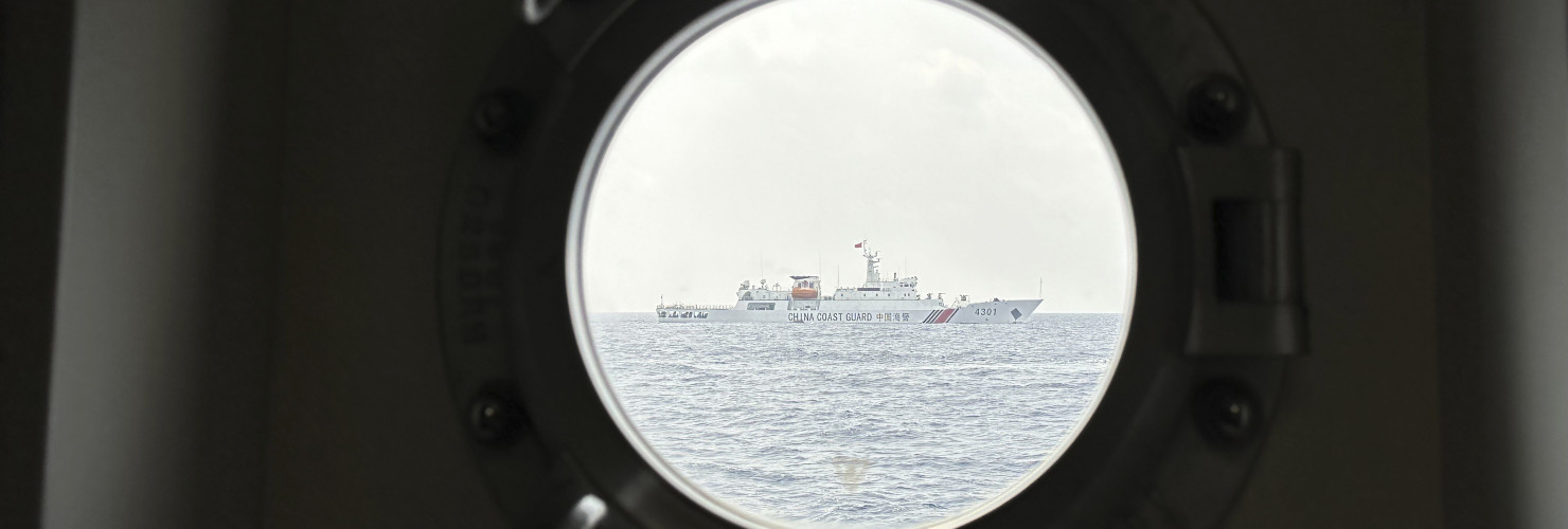 A Chinese coast guard ship blocks Philippine coast guard ship, BRP Sindangan as it tried to head towards Second Thomas Shoal at the disputed South China Sea during rotation and resupply mission on Wednesday, Oct. 4, 2023.