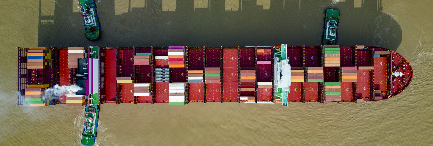 An aerial photo shows a container ship loaded with containers leaving the wharf at Yangshan Deep Water Port Area of Shanghai Port in Shanghai, China, Sept 11, 2022.