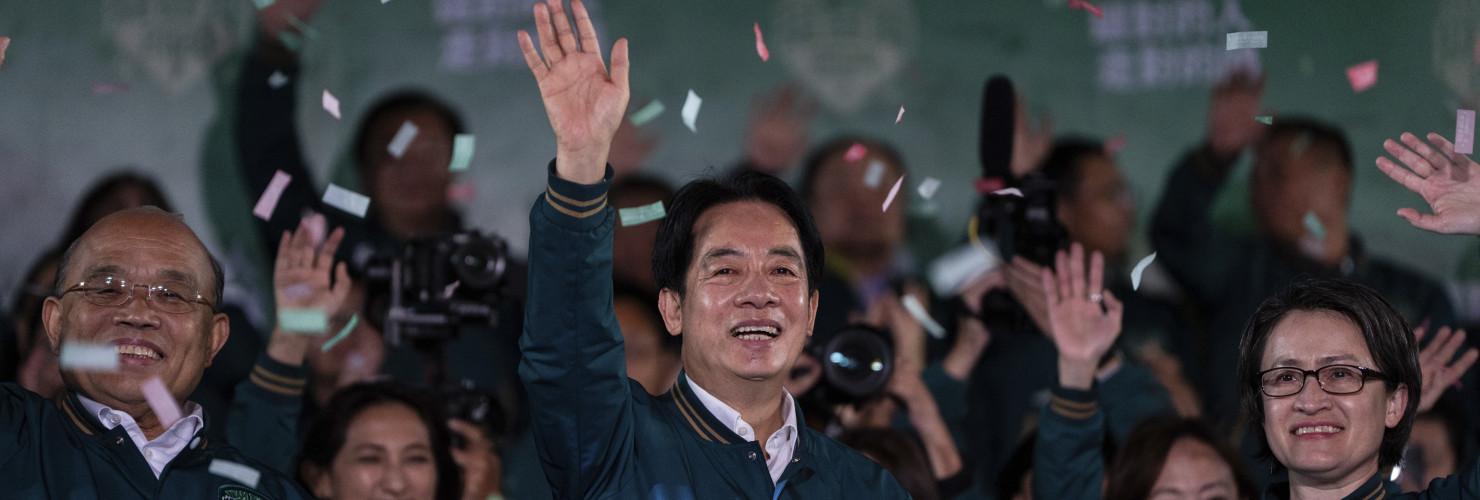 Taiwanese Vice President Lai Ching-te, also known as William Lai, left, celebrates his victory with running mate Bi-khim Hsiao in Taipei, Taiwan, Saturday, Jan. 13, 2024. 