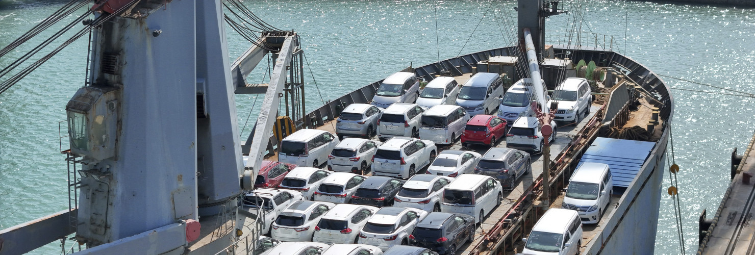 A ship is loaded with vehicles for export in a port in Yantai in east China's Shandong province.