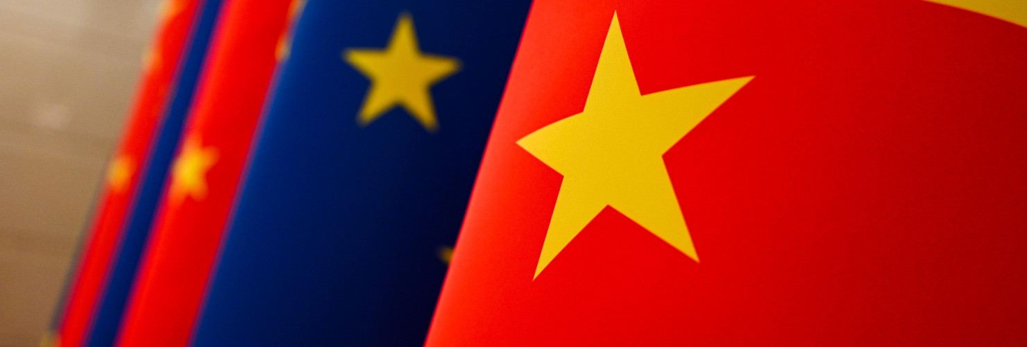 The European Union and Chinese flags. 