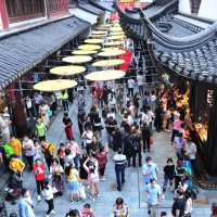 People enjoy the scenery near Yu Garden, a tourist attraction in Shanghai, China, 3 October 2020. 