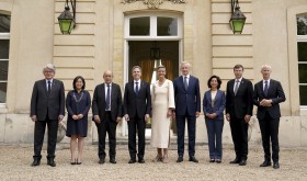 Antony Blinken, Margrethe Vestager and other guests pose for a group photo ahead of a dinner at the U.S.-European Union Trade and Technology Council summit, in Paris May 15, 2022