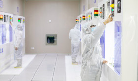 A worker makes and tests semiconductor power device chip products at a workshop of a microelectronics company in Binhai New Area, Hai 'an City, East China's Jiangsu Province, March 23, 2023.