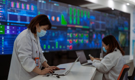 A photo taken during a press tour shows employees working at the Jabil factory producing PCBs (printed circuit boards) and other electronic components, in Wuxi, China, 21 February 2023. 