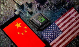 The flags of China and the USA are being displayed on a smartphone, with an NVIDIA chip visible in the background.