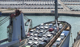 A ship is loaded with vehicles for export in a port in Yantai in east China's Shandong province.