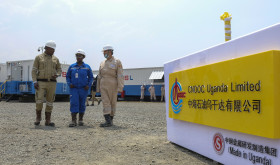 Ugandan and Chinese workers at an oil field in western Uganda